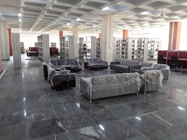 Study area with covered furniture